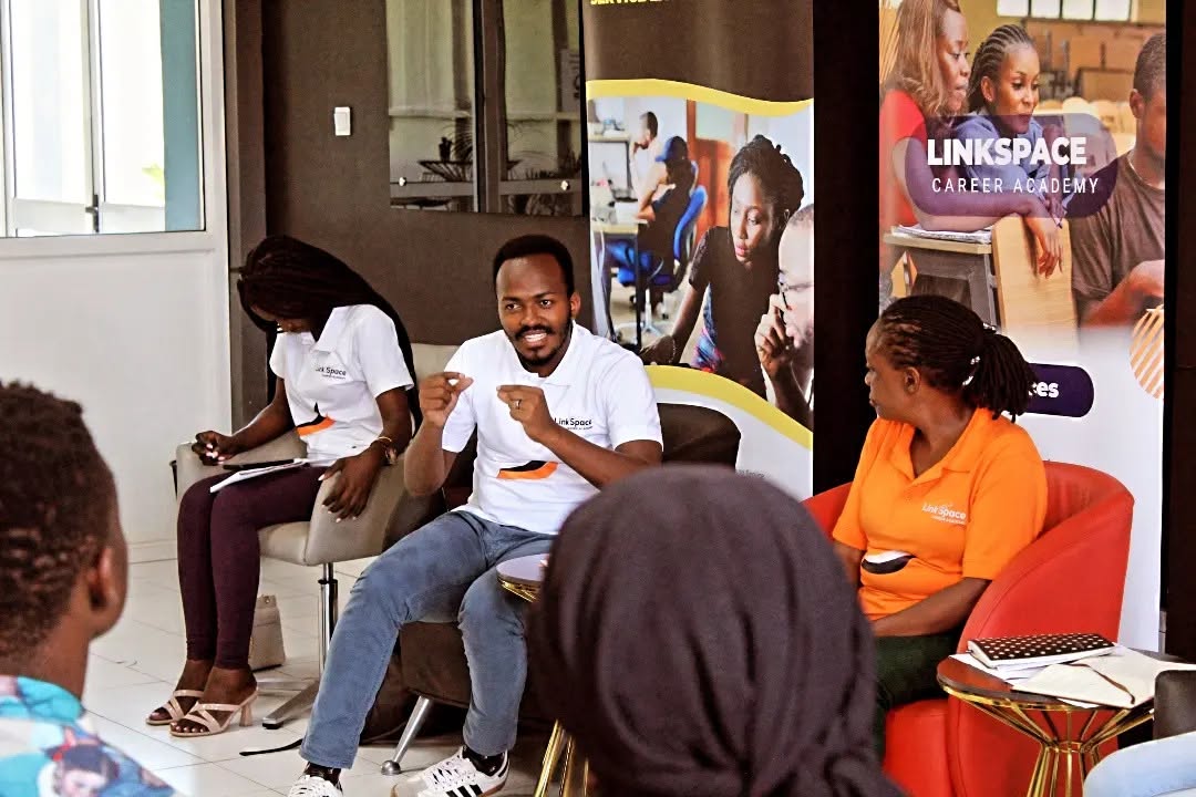A young learner in class, kept in school through QuickFees support